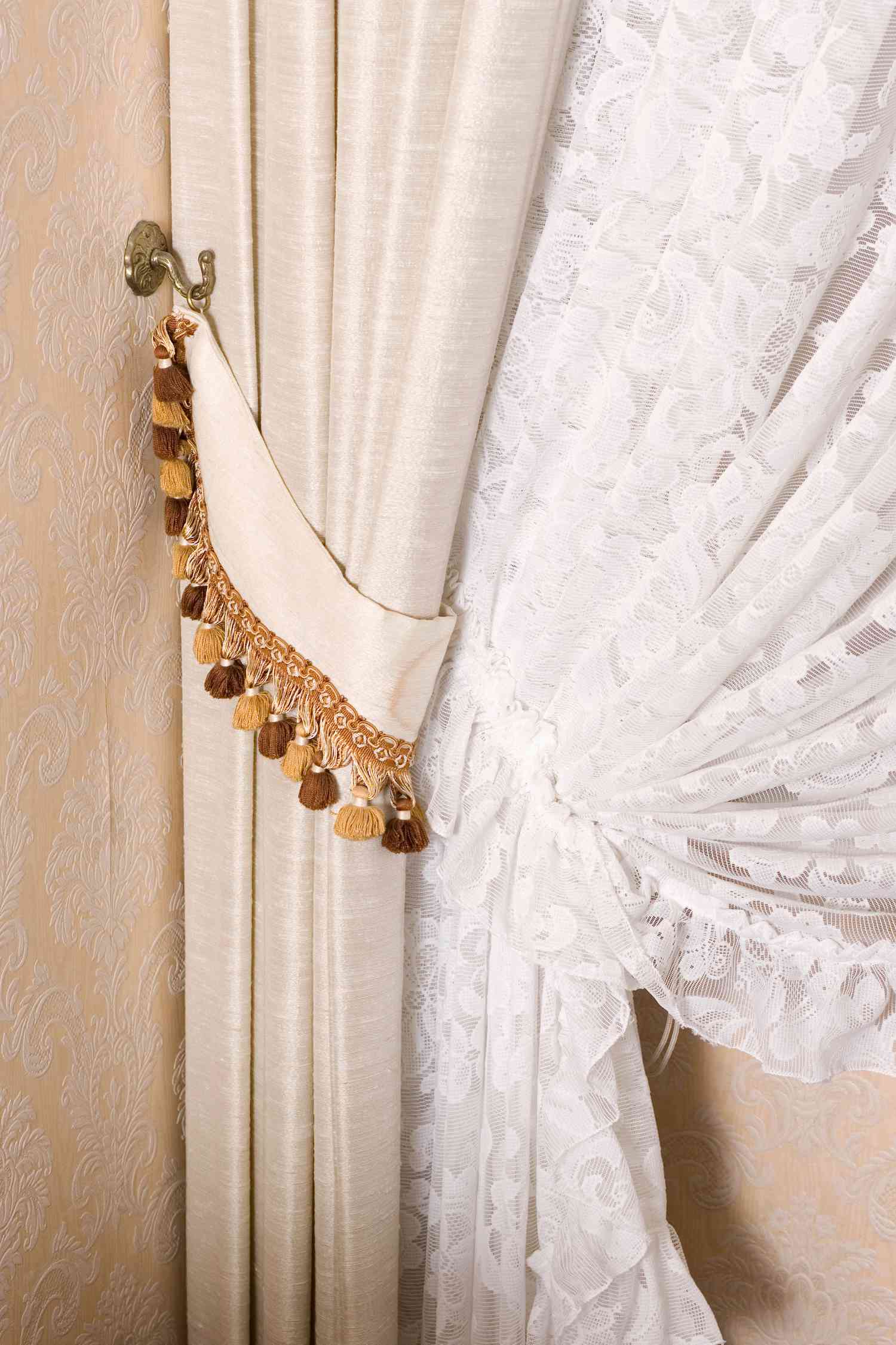 Layered curtains with tassel