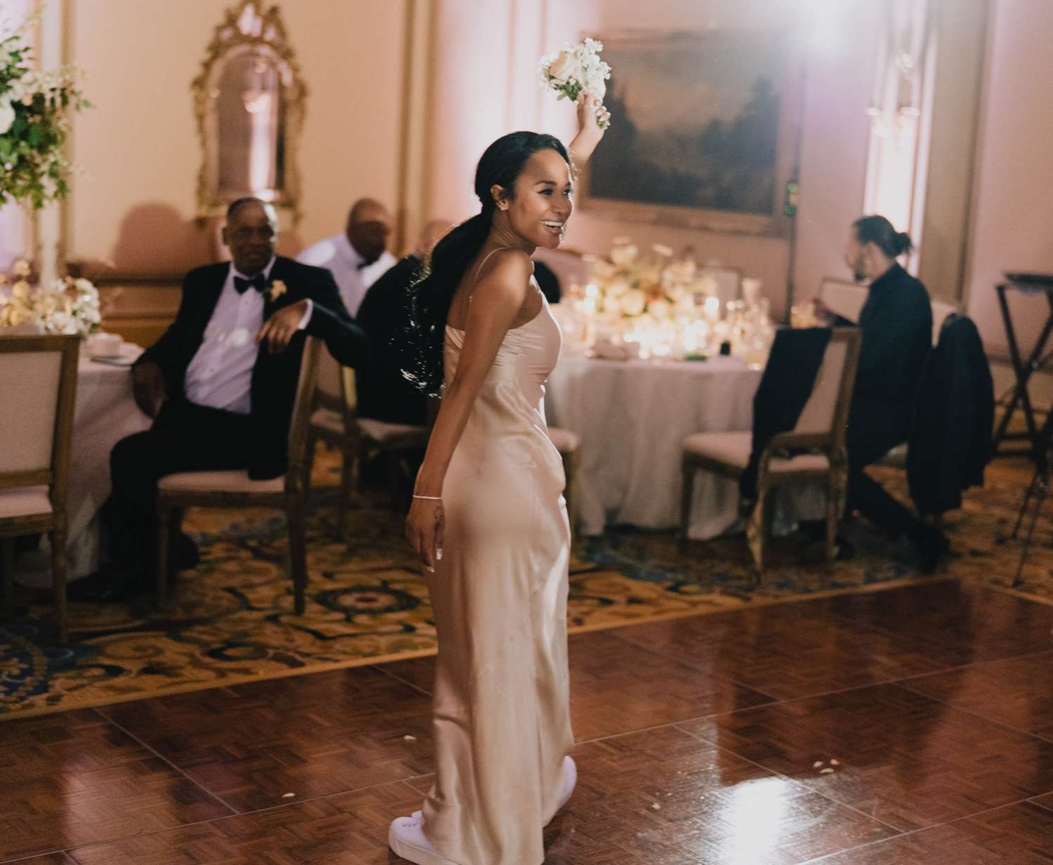 bride during bouquet toss