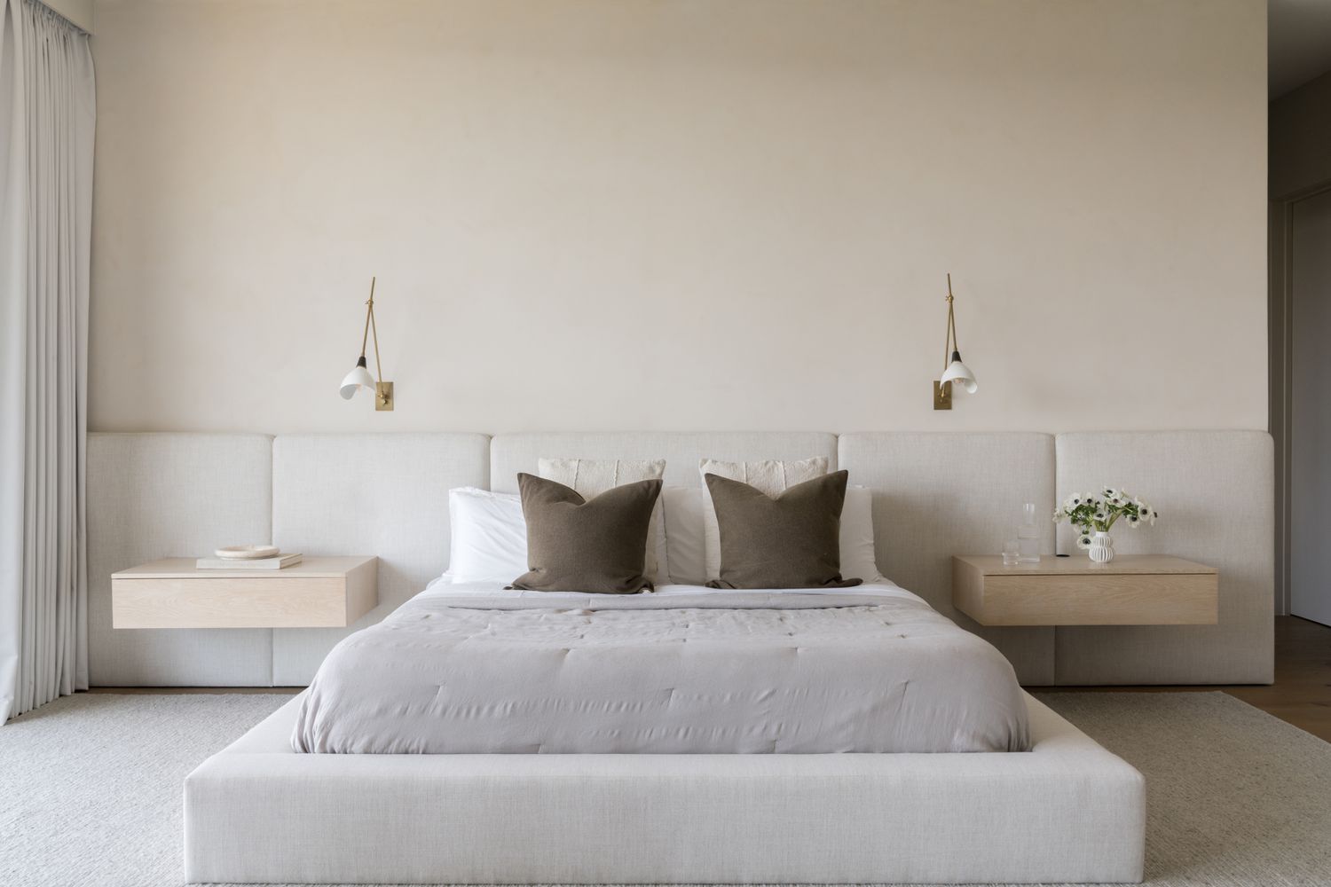 white bedroom upholstered wall