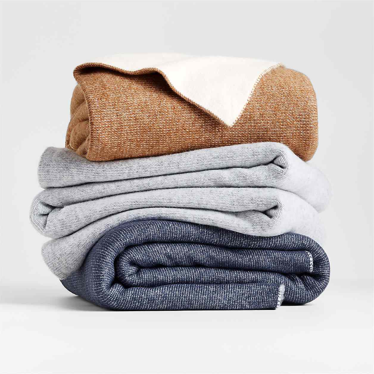A stack of folded blankets