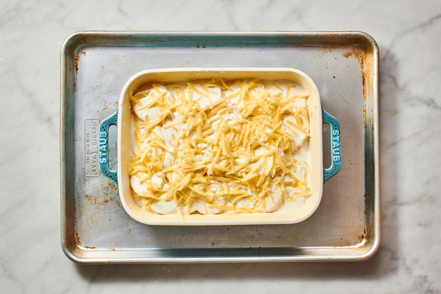 Dauphinoise Potatoes - in casserole for baking