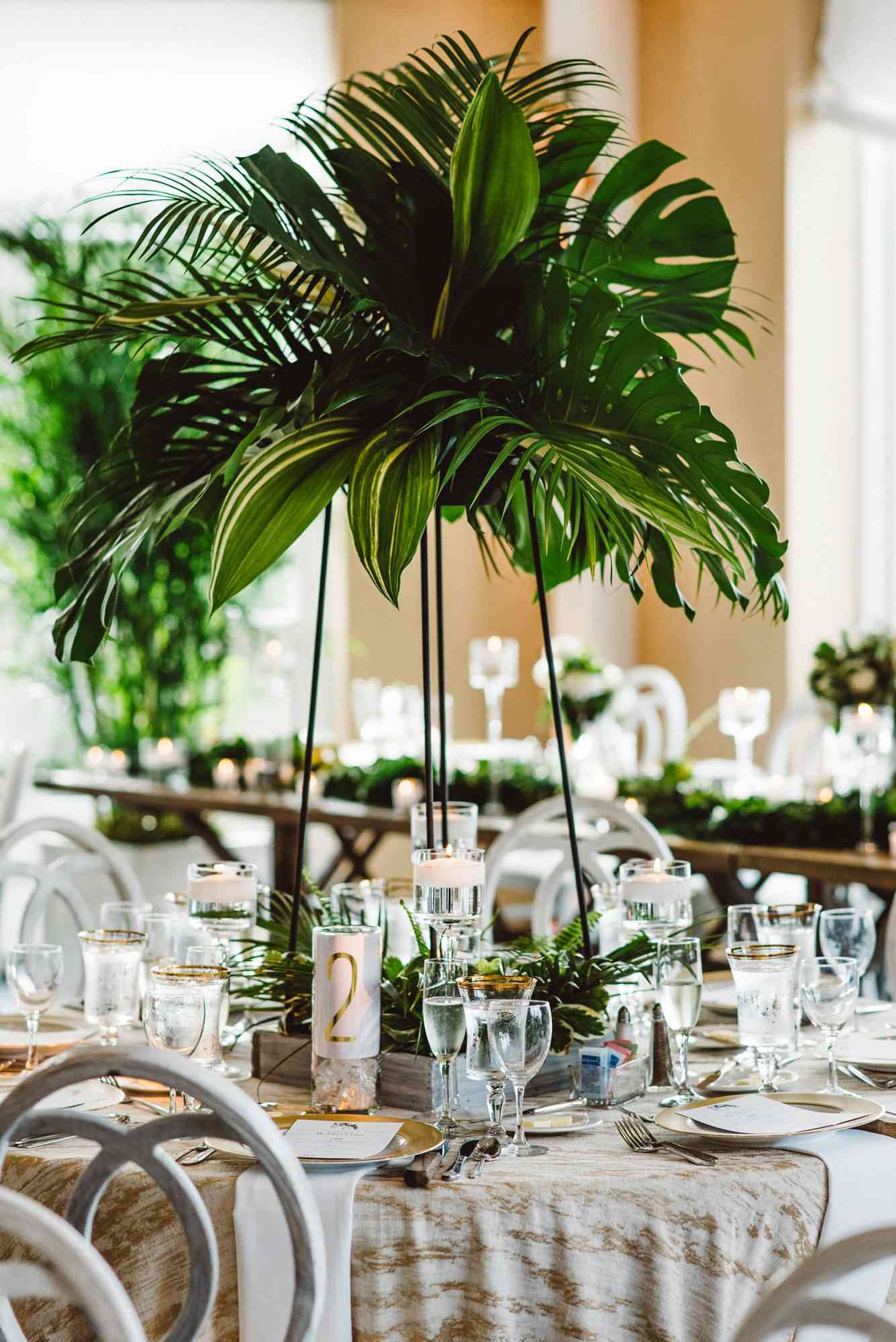 tall centerpiece with greenery