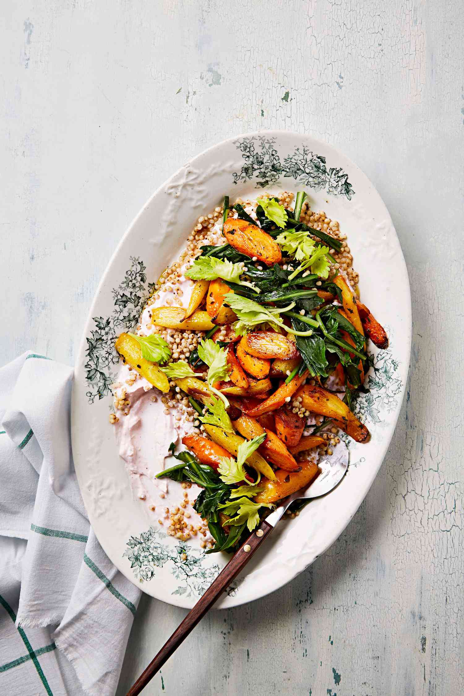 sorghum salad with carrots dandelion greens