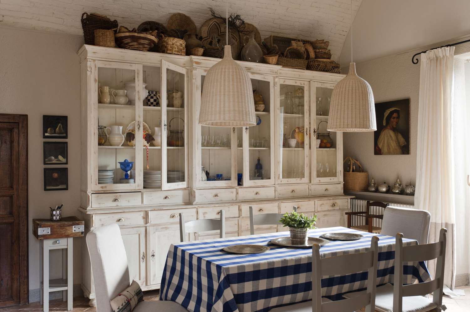 rustic kitchen with oil painting on wall