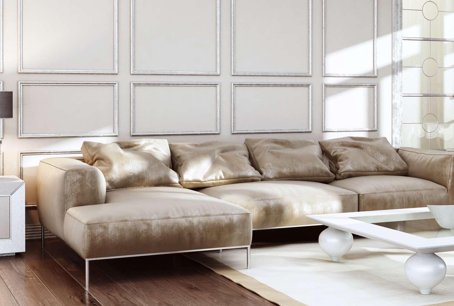 A luxuriously styled living room with a contemporary sectional sofa and a rectangular coffee table with spherical legs