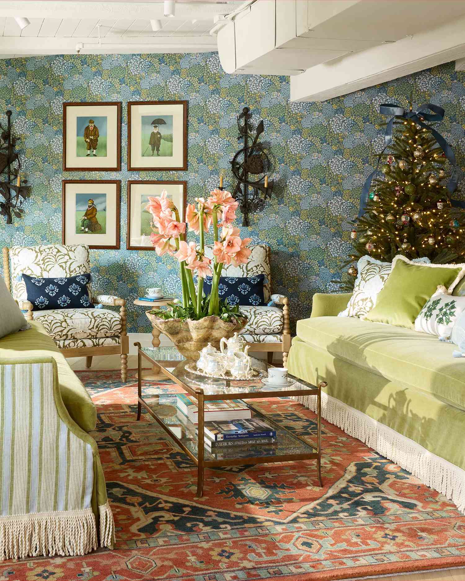 a living room with blue and green wallpaper