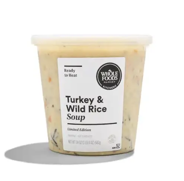 Container of Whole Foods Market turkey and wild rice soup