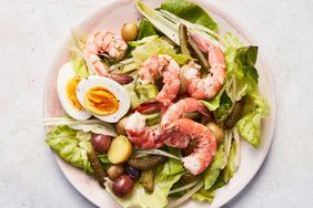 scandinavian shrimp salad served on a pink plate