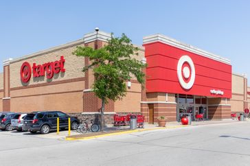 Exterior view of a Target store with its logo visible and a parking lot in front