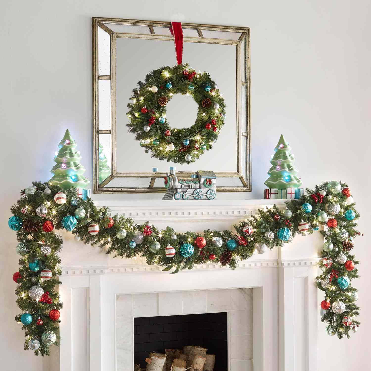 Christmas wreath and garland on a fireplace mantel. 
