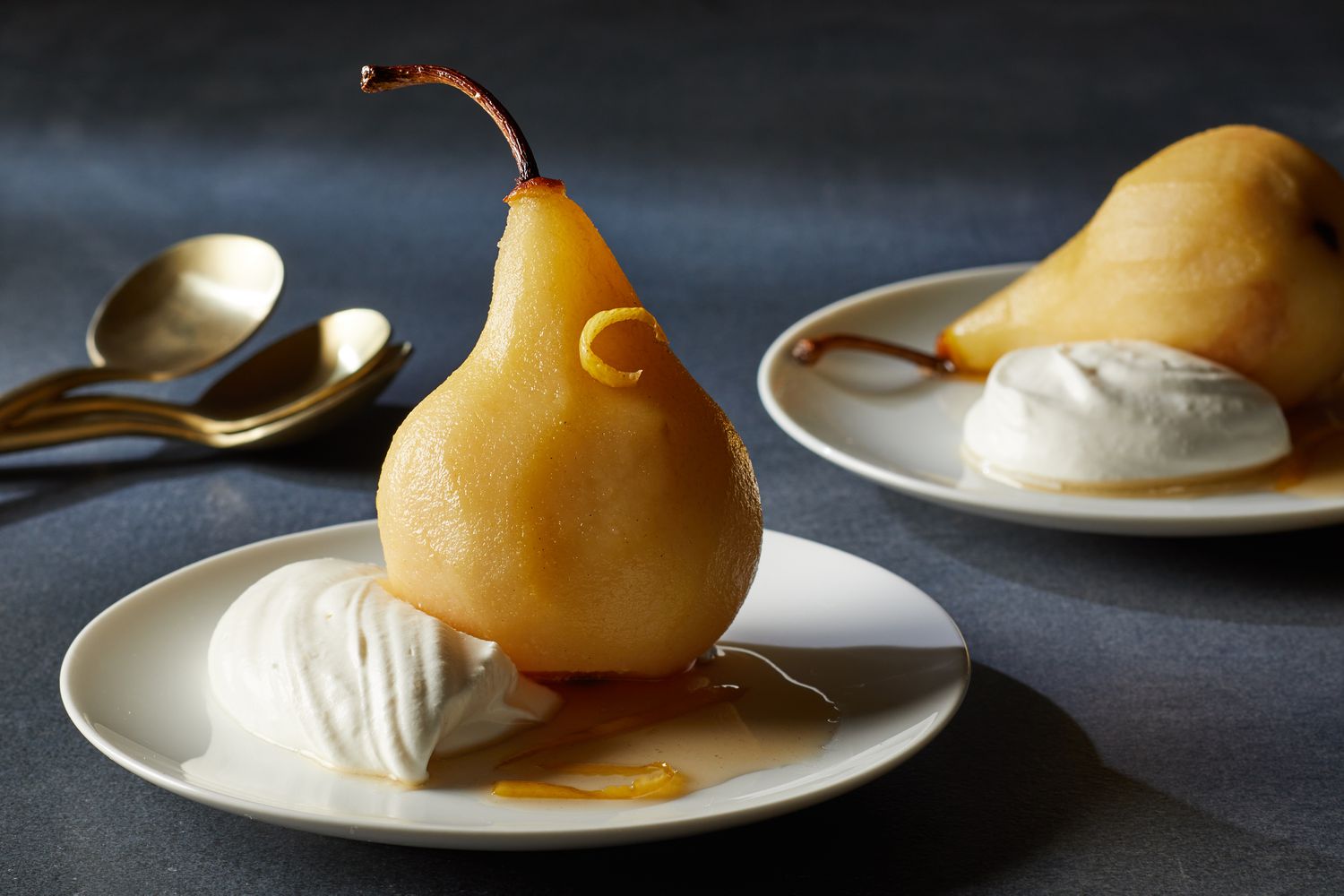 poached pears on plates