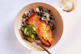 salmon-shiitake rice bowls served with cucumber