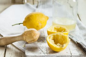 Lemon rinds and peels on cutting board