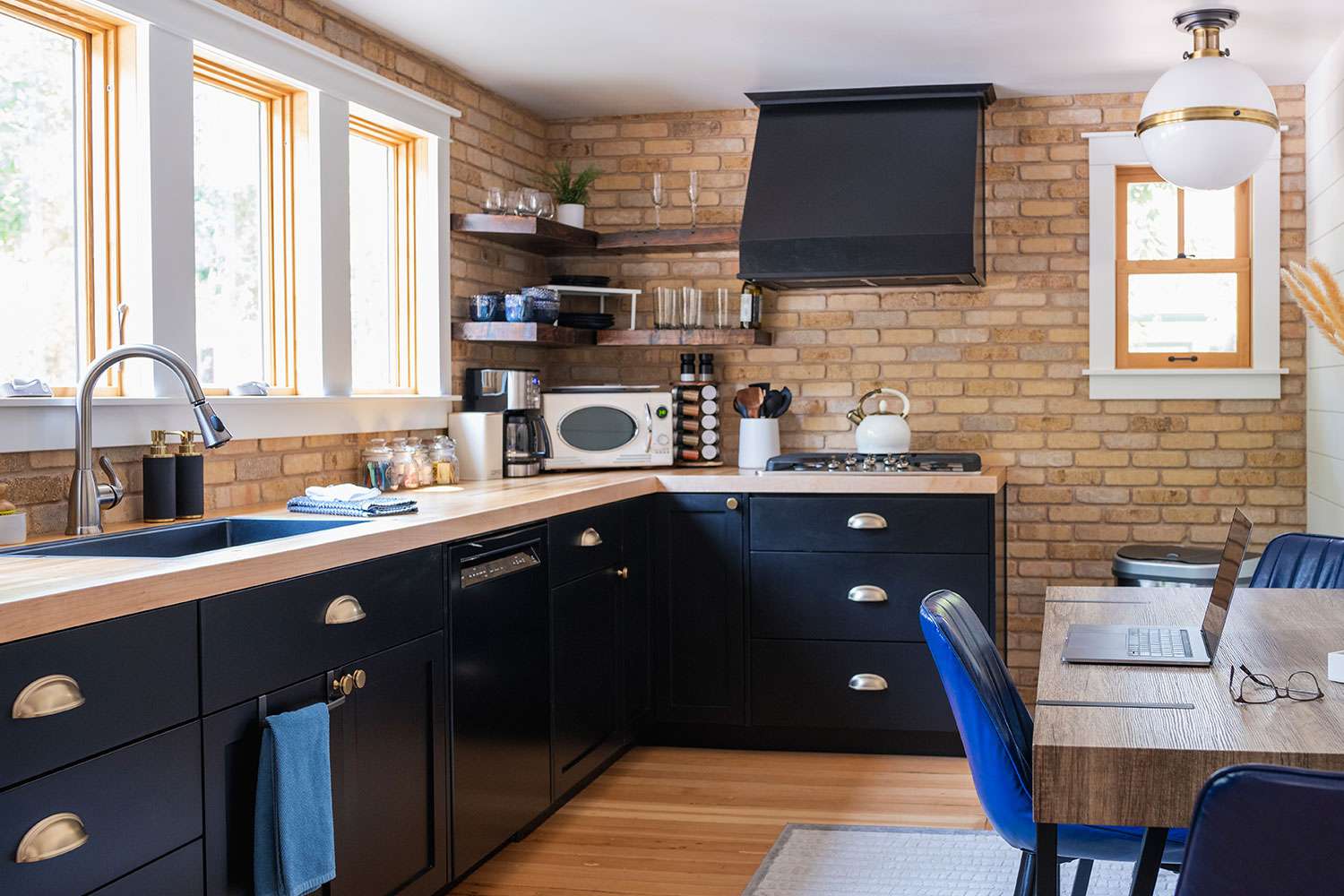 Kitchen with brick wall/backsplash