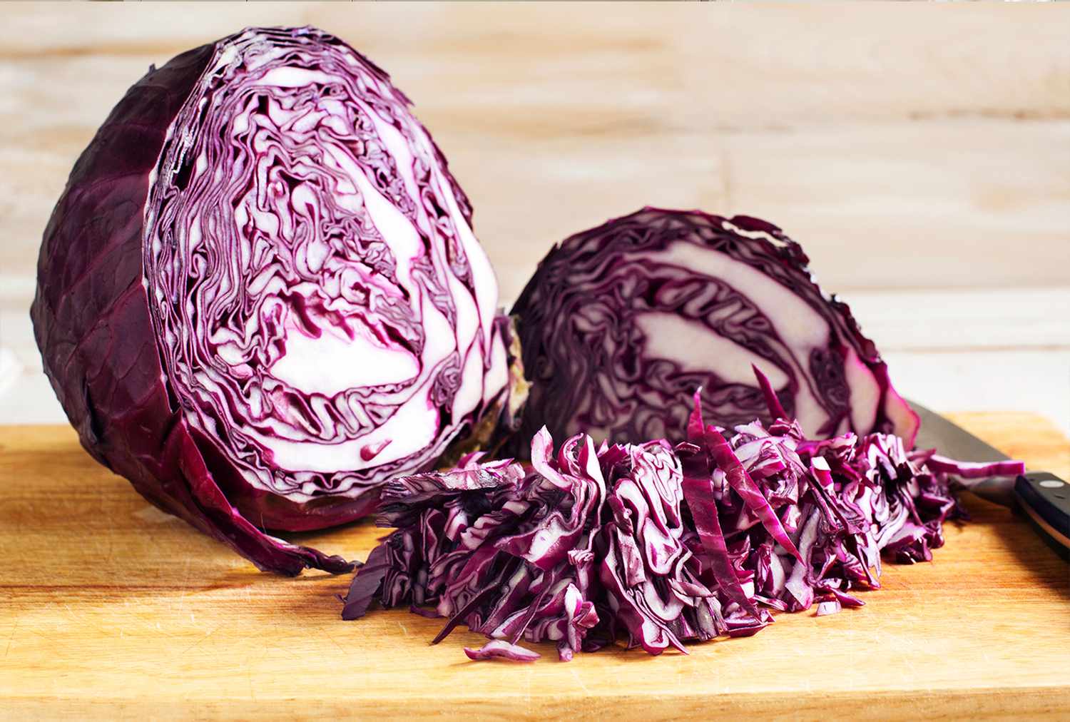 Red cabbage on cutting board