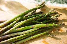 Asparagus on cutting board