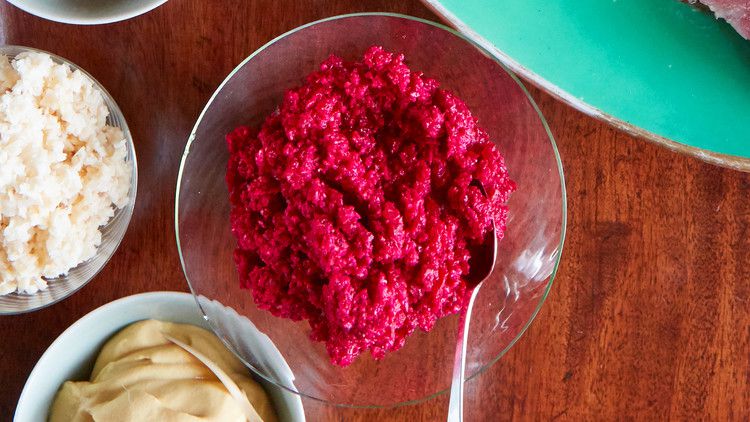 fresh red horseradish sauce in glass bowl
