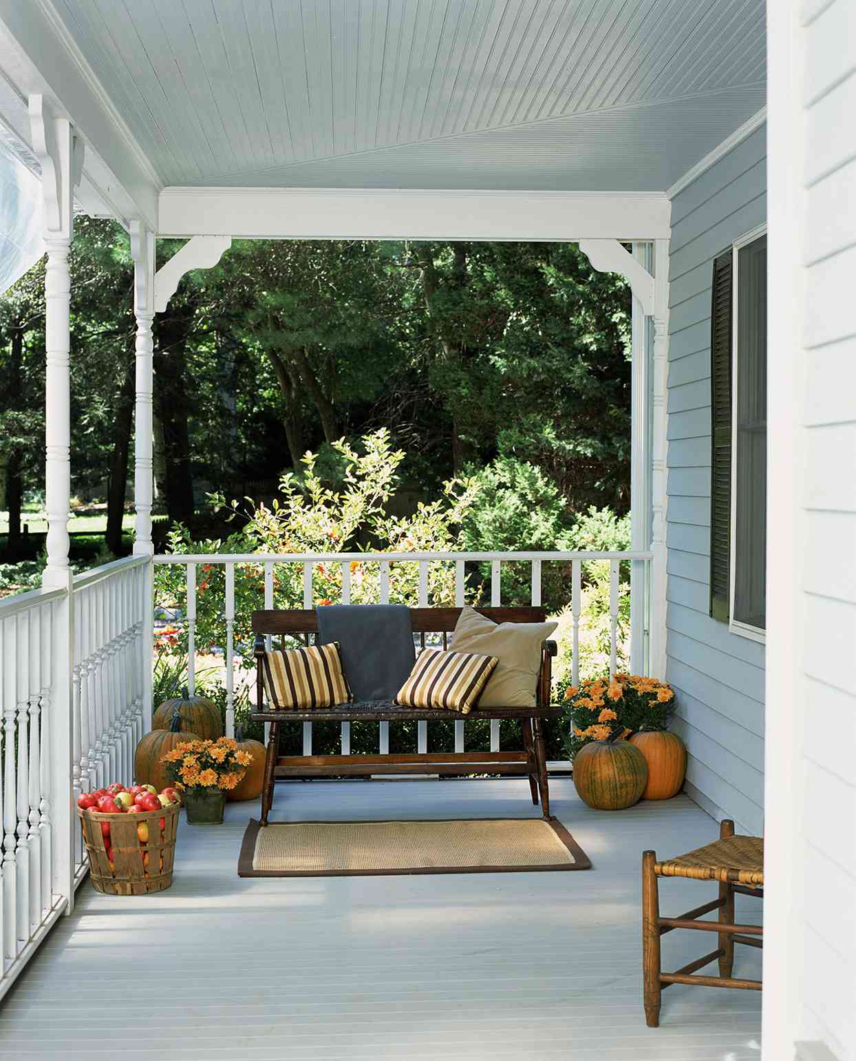 Wooden bench on front porch