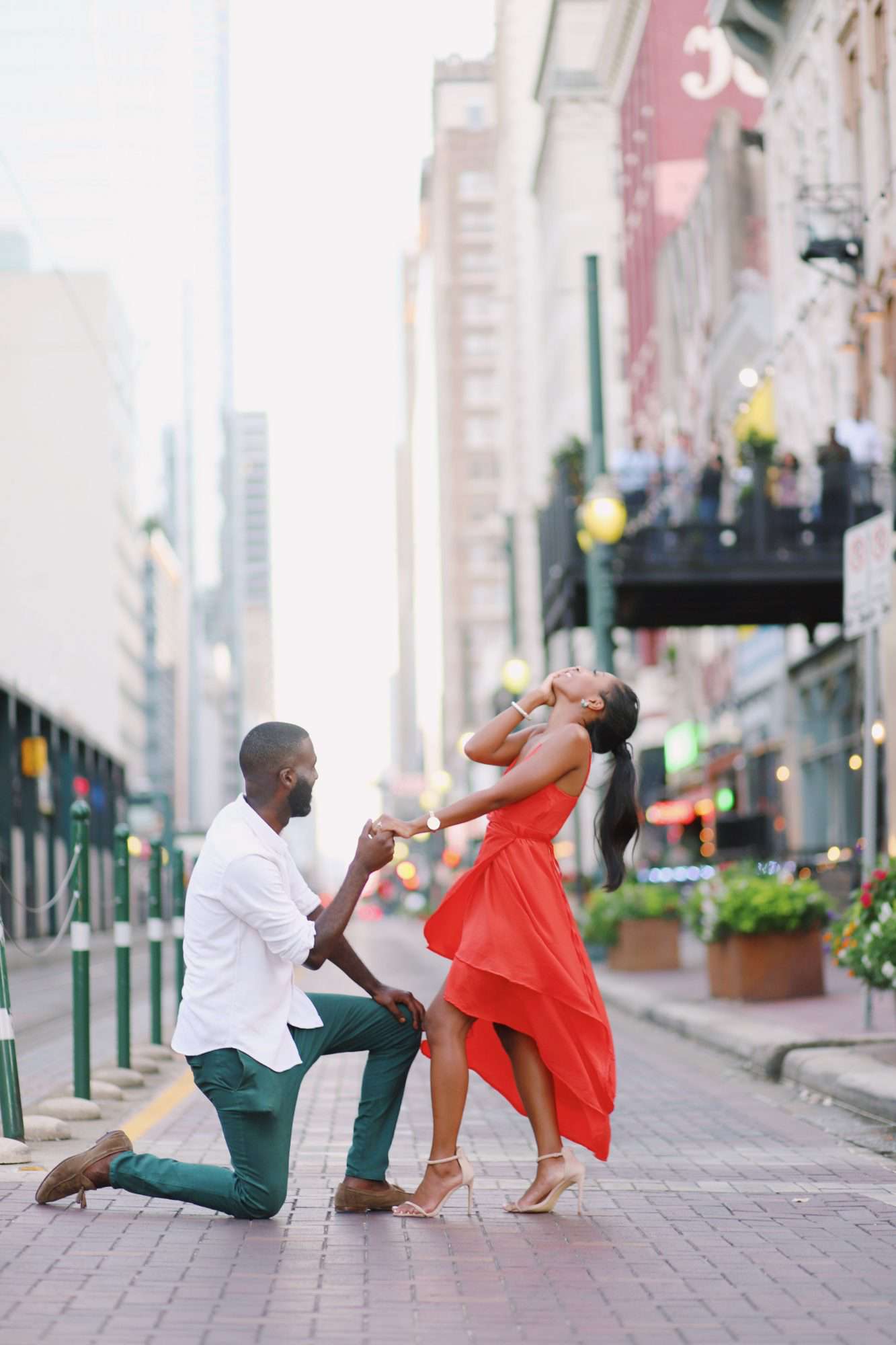 perfect proposals man proposing to girl in red dress