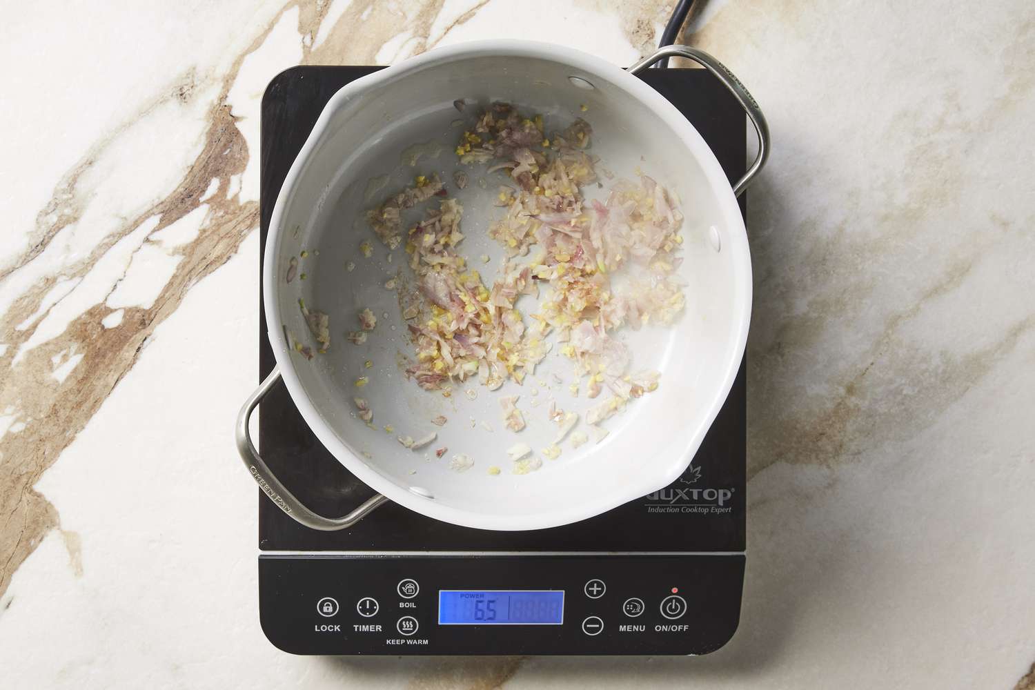 Creamy ginger asparagus soup onions in skillet