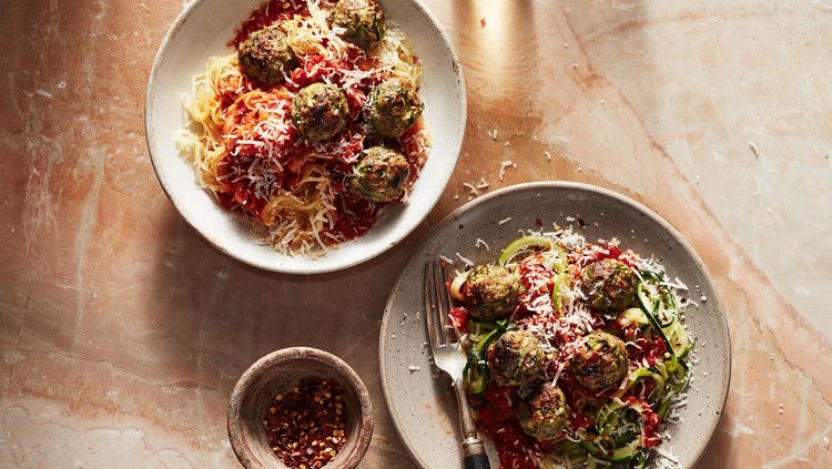 bowls of spaghetti squash and zucchini noodles with zucchini meatballs