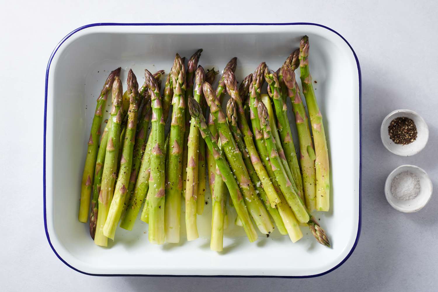 asparagus drizzled with oil and ready for roasting