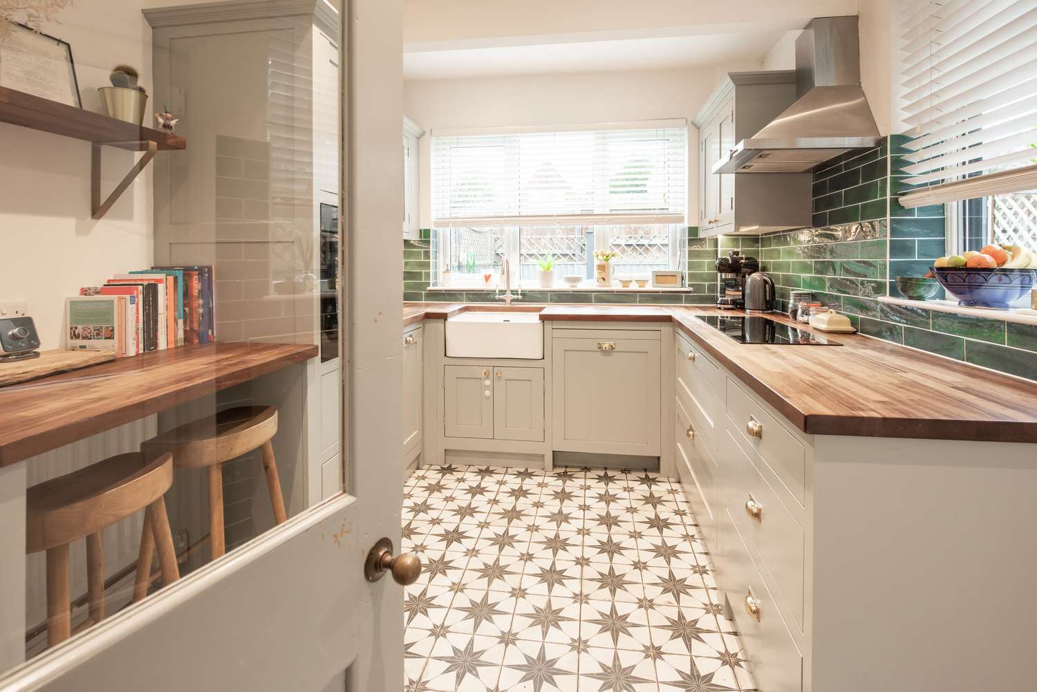 Vintage style kitchen with patterned linoleum flooring 