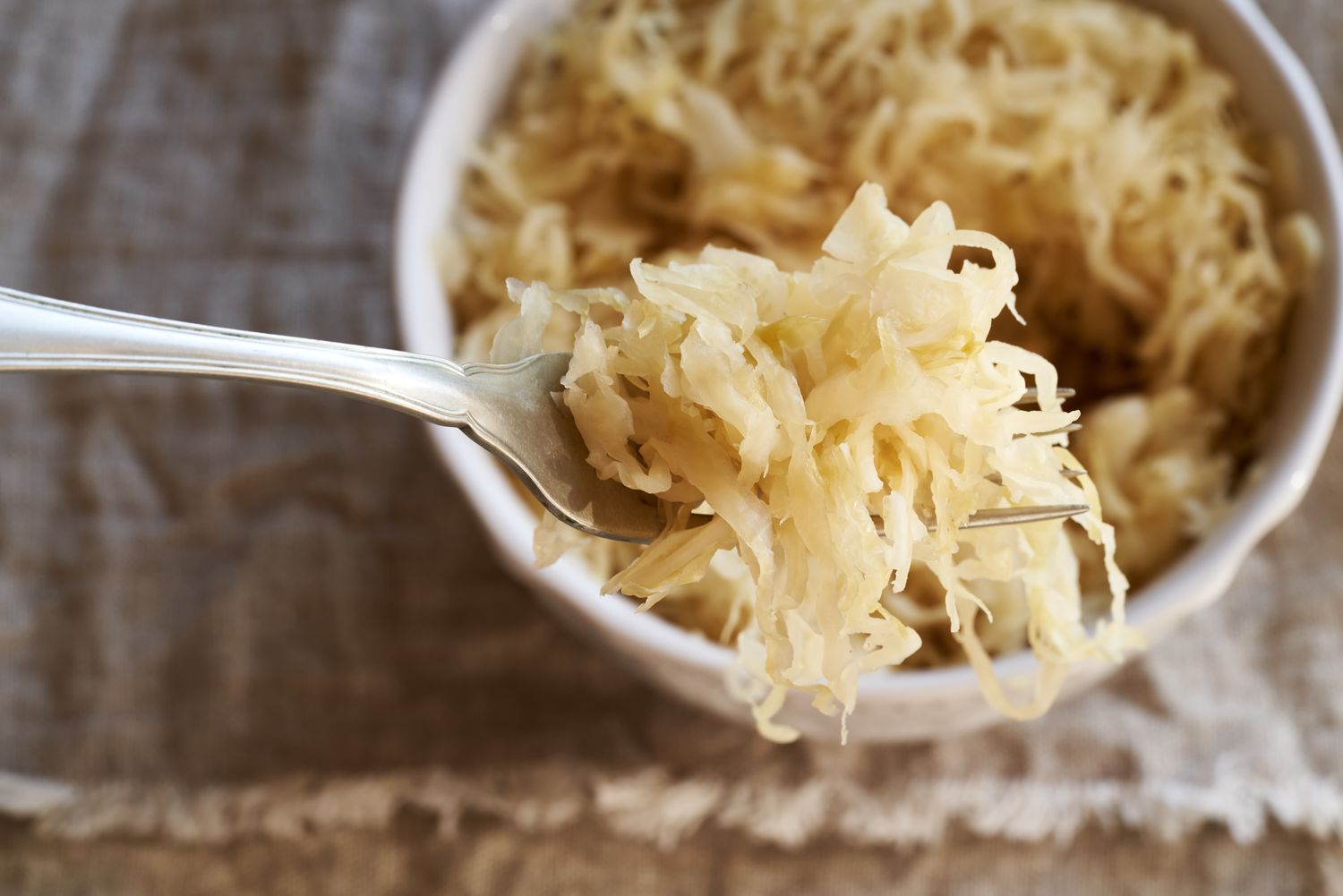 sauerkraut in a bowl and on a fork