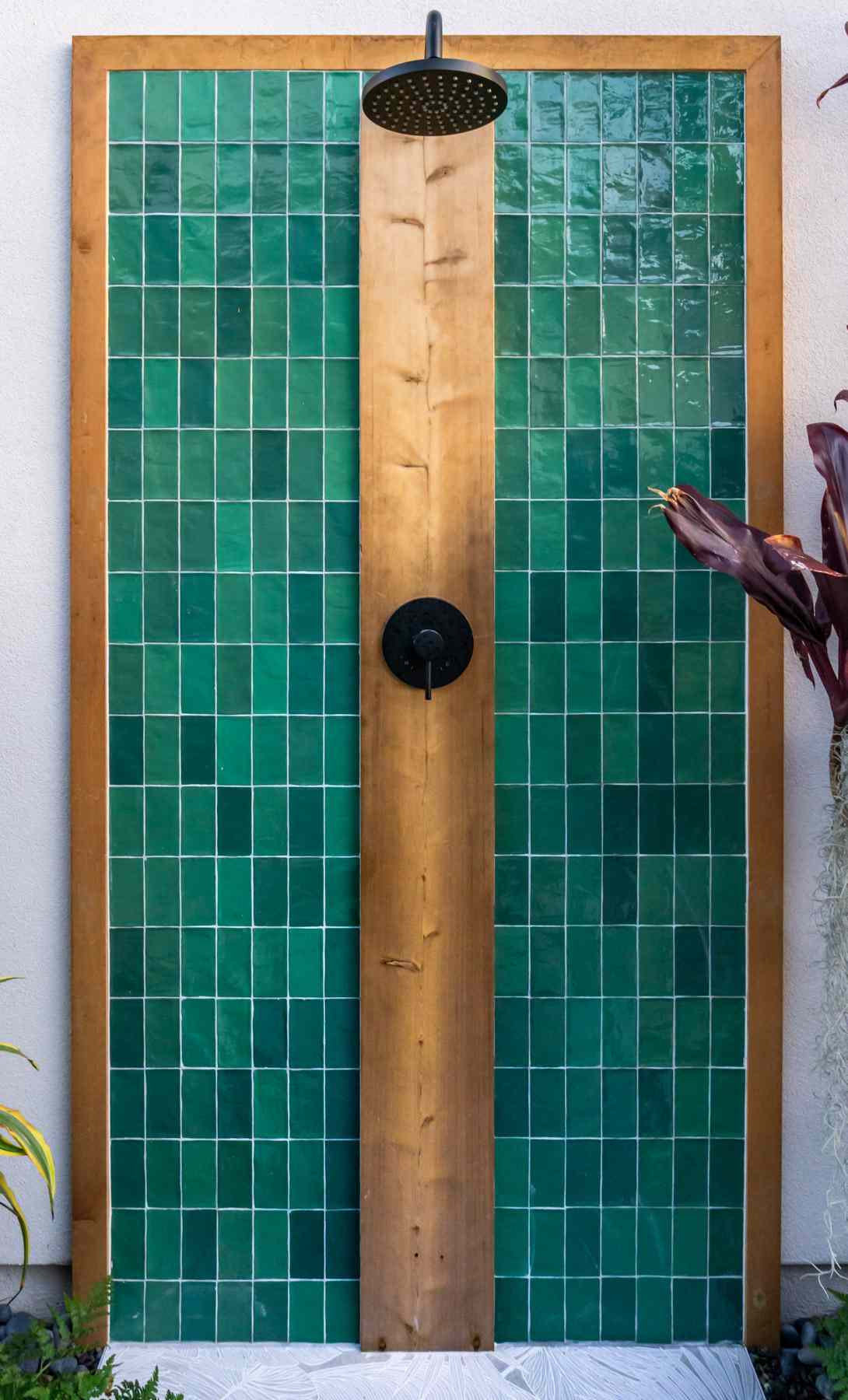 Outdoor shower with a vibrant, tropical design.
