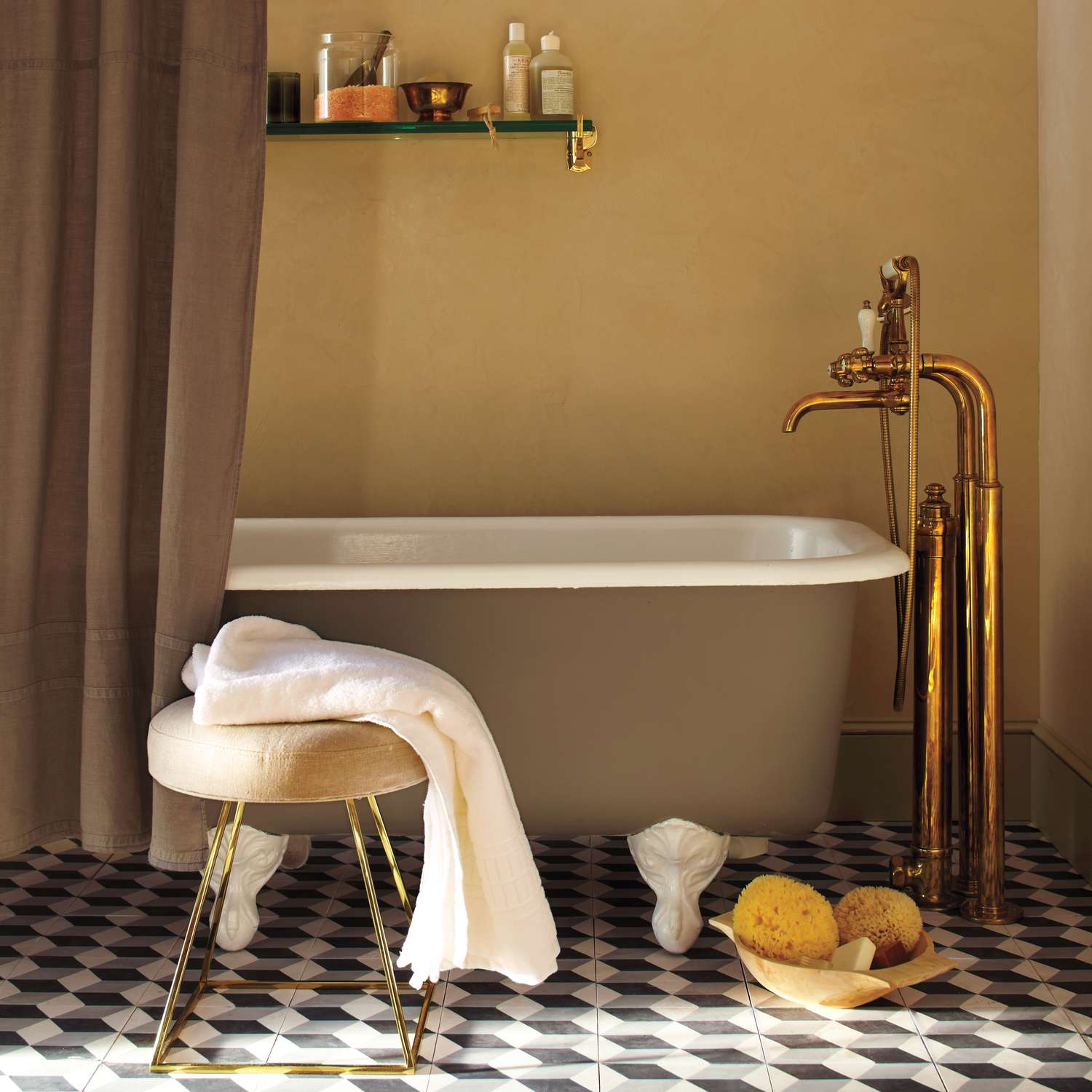 A bathroom with a brown tub 