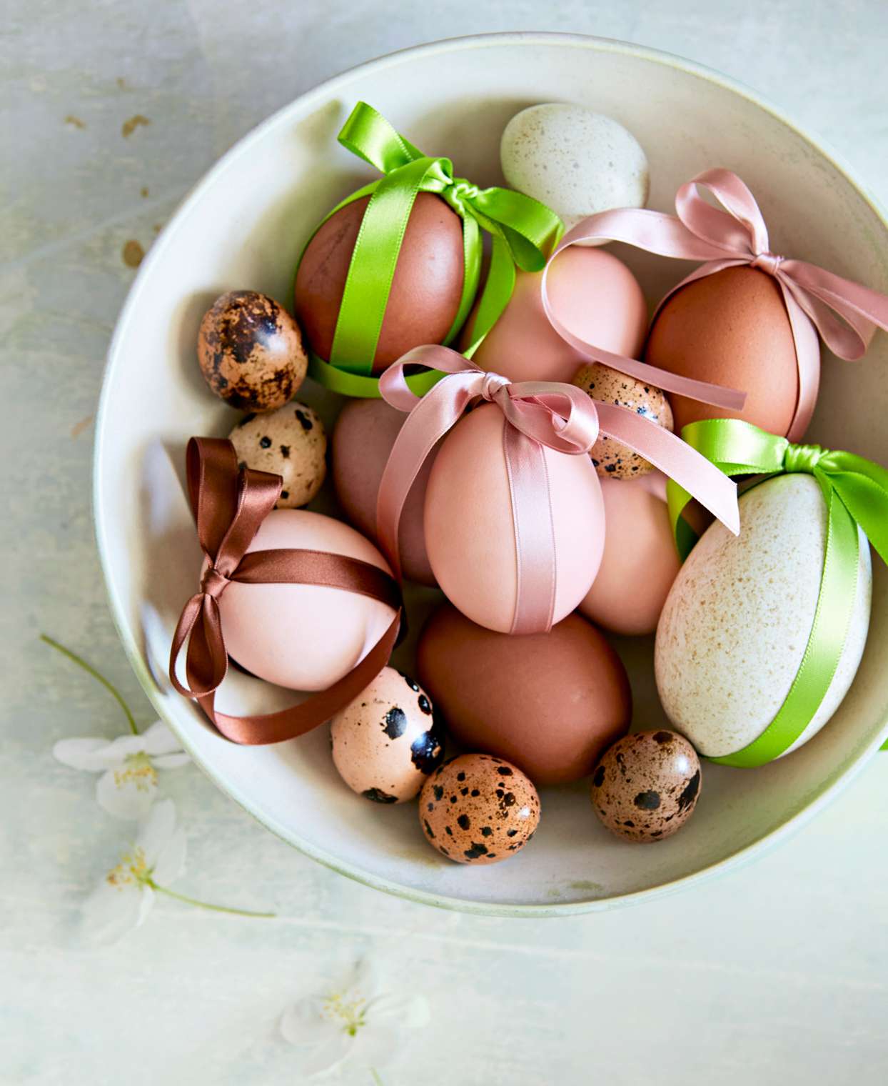 pastel pink and green easter eggs with ribbon