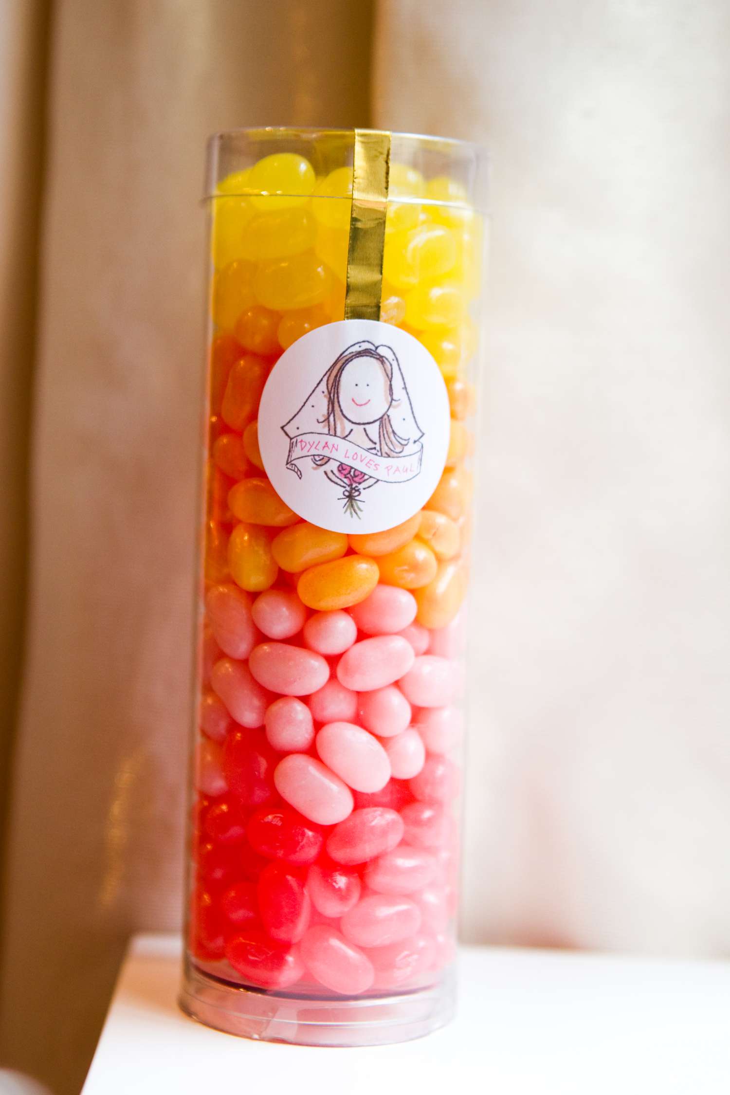 colorful jellybeans in cylinder