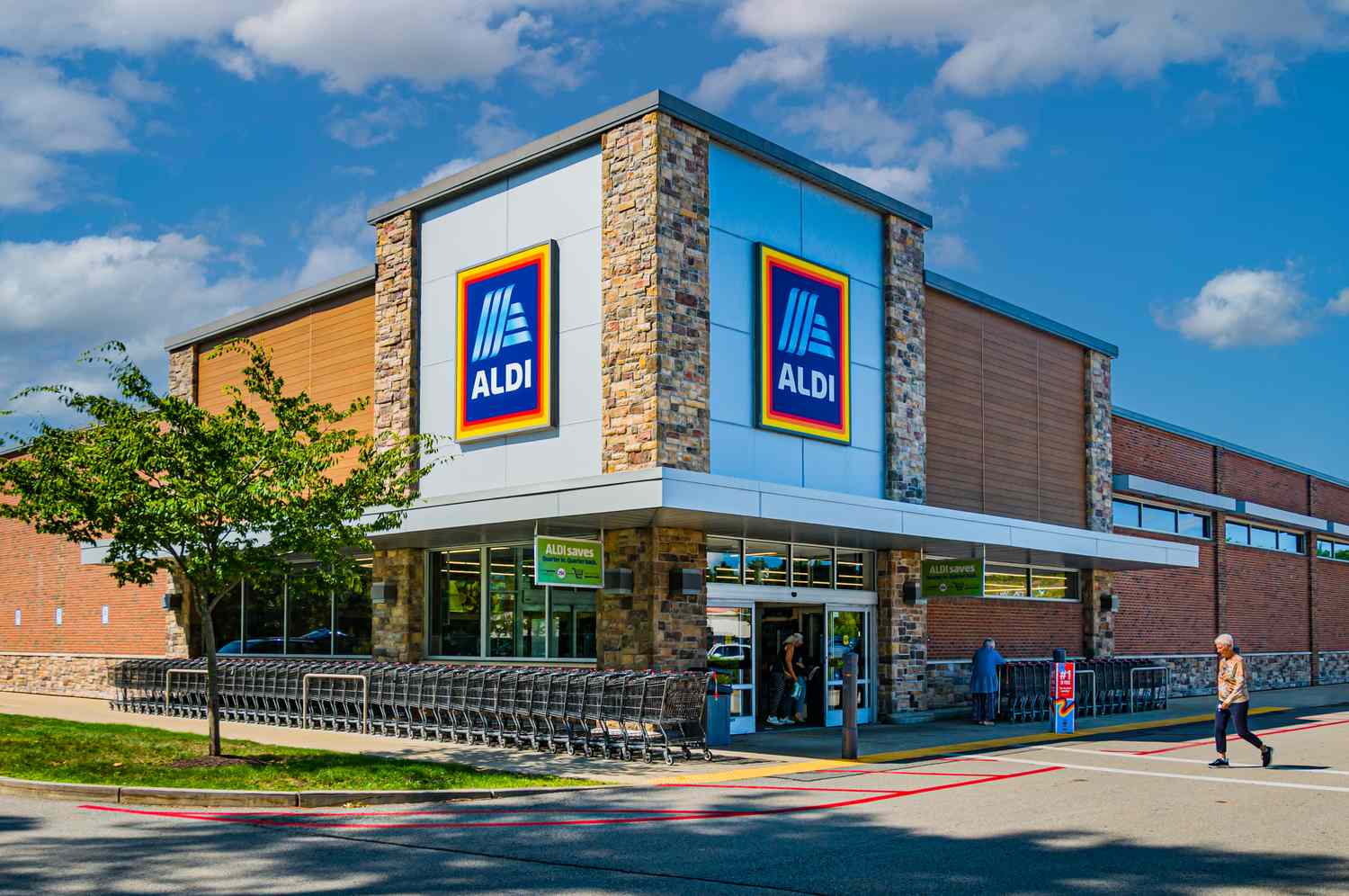 An Aldi grocery store exterior with the logo prominently displayed on the building