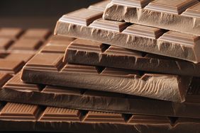 Stack of chocolate bars arranged in a diagonal pile