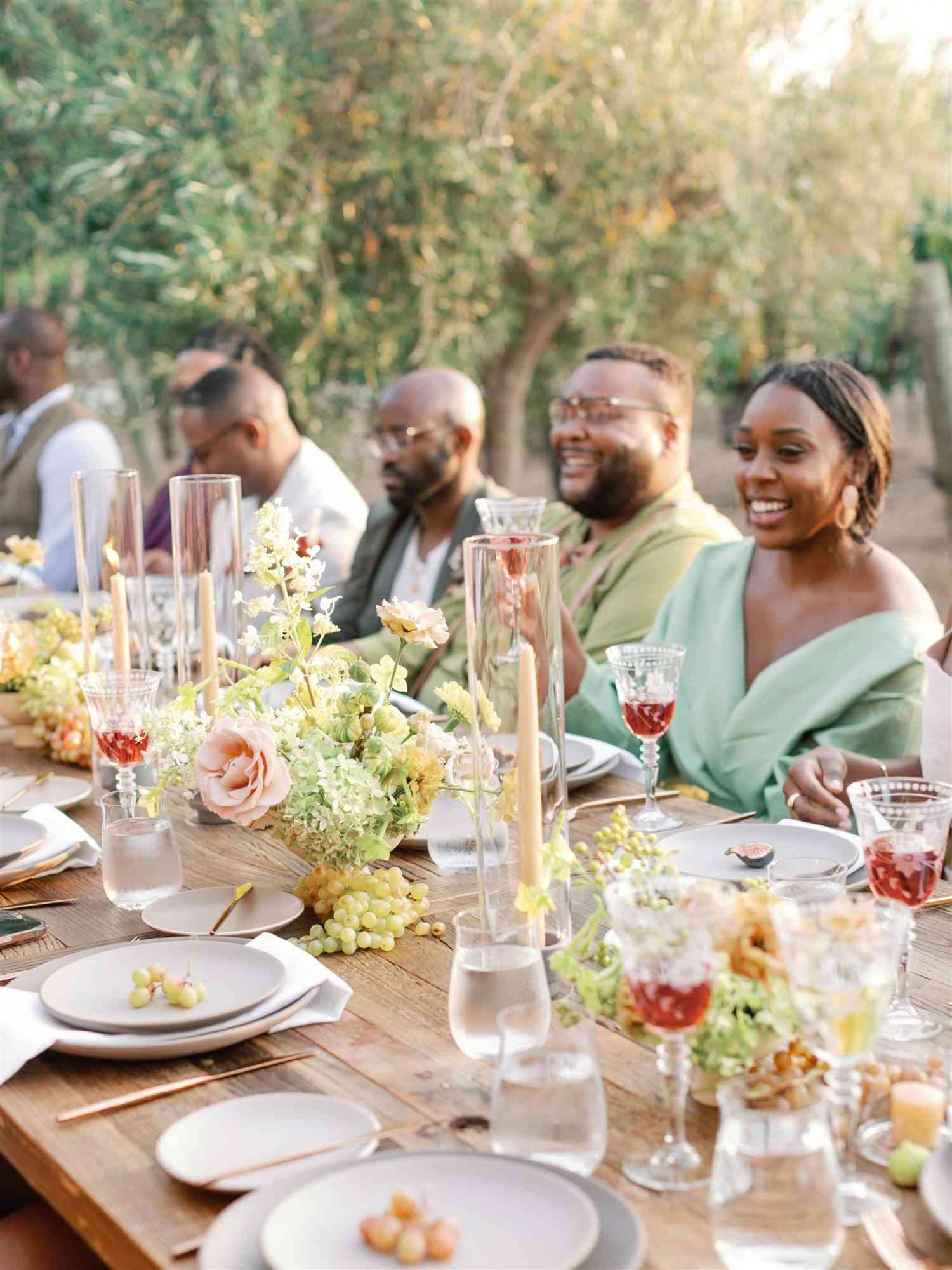 guests at rehearsal dinner at a california vineyard