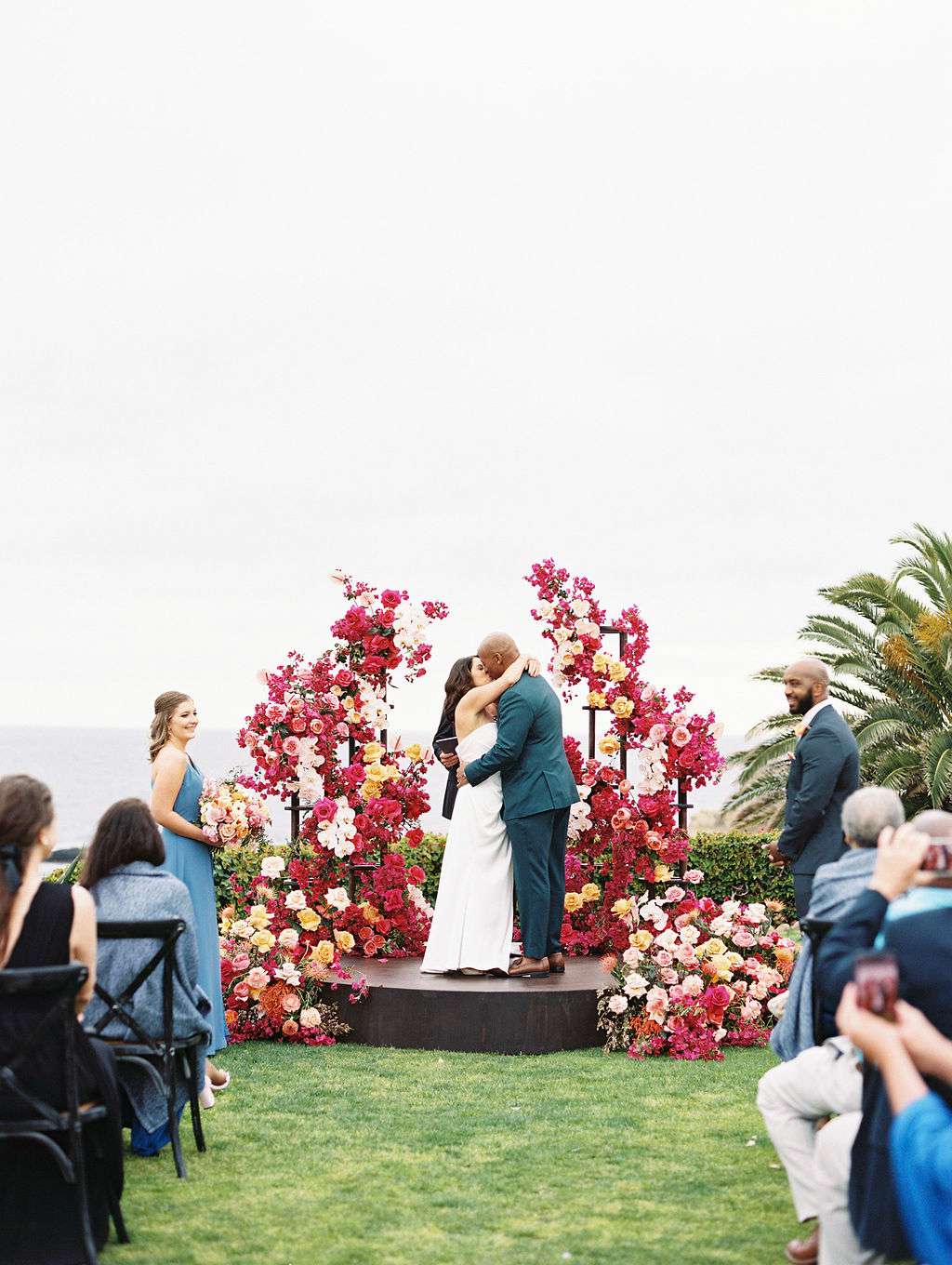 bride and groom kissing during ceremony