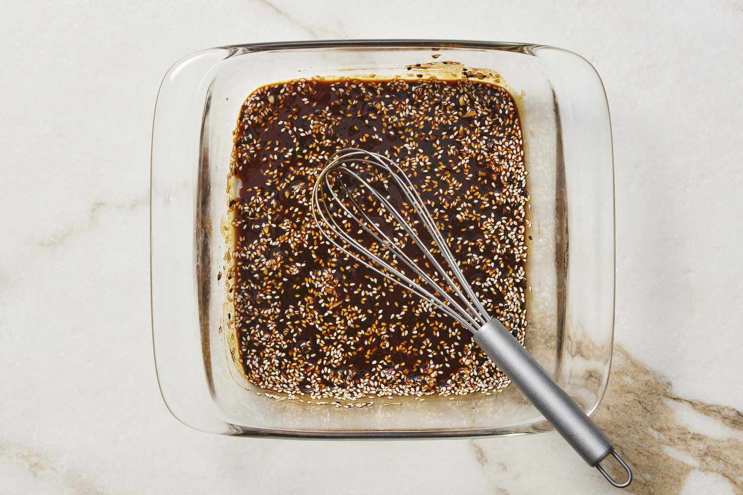 Sesame marinade in glass dish
