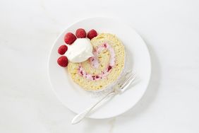 raspberry swirl jelly roll slice on plate