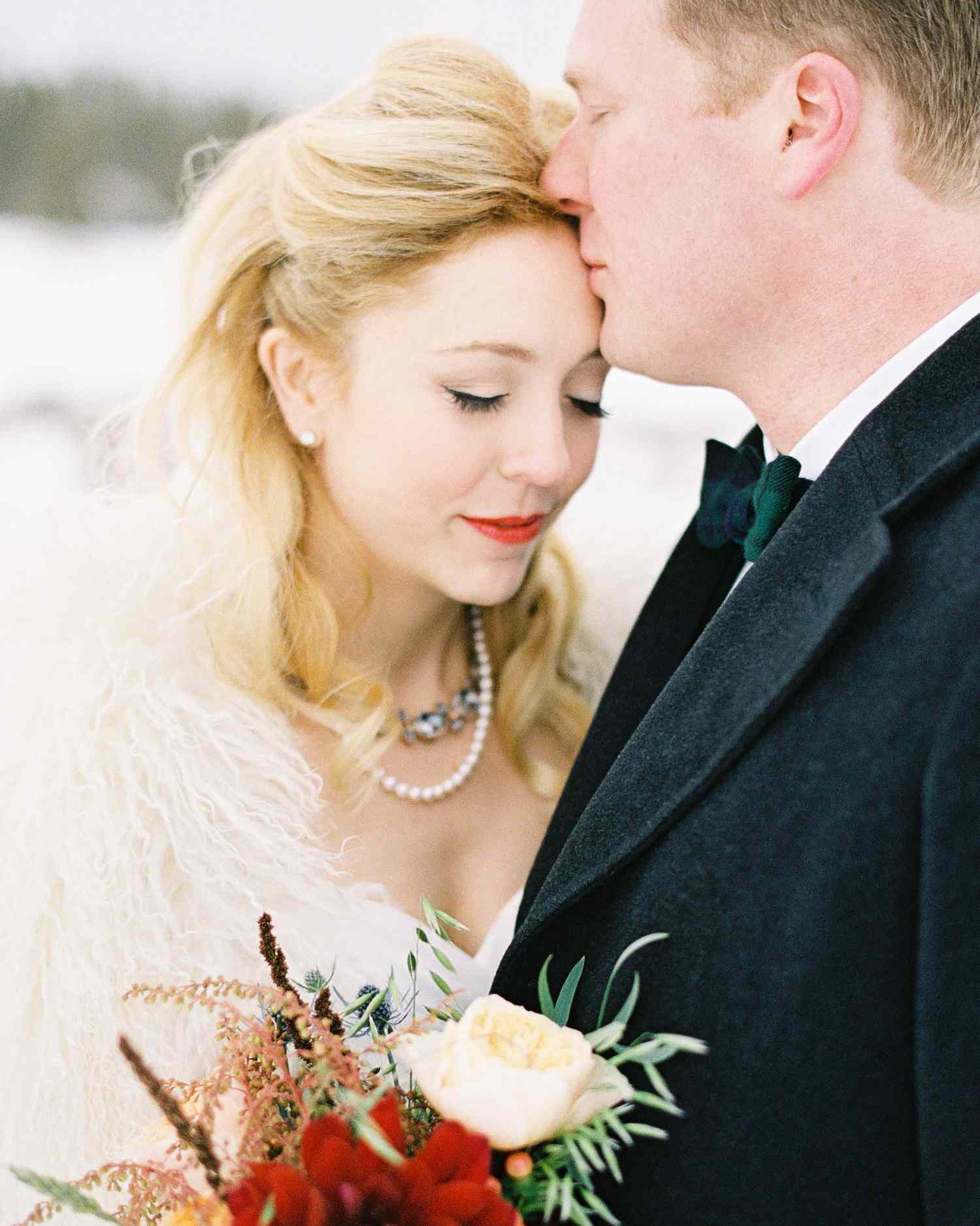 bride and groom walking holding hands