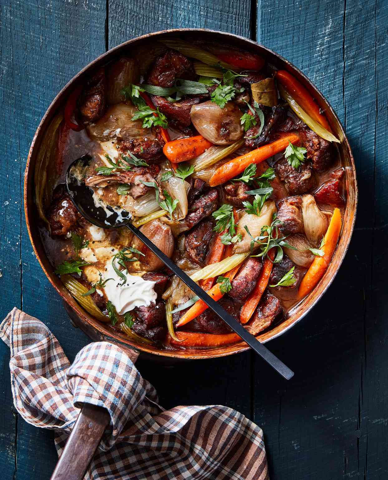normandy-style pork stew served with fresh herbs
