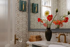 bathroom with floral wallpaper
