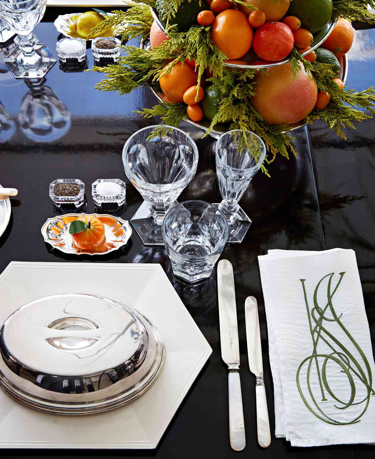 centerpiece table oranges greenery