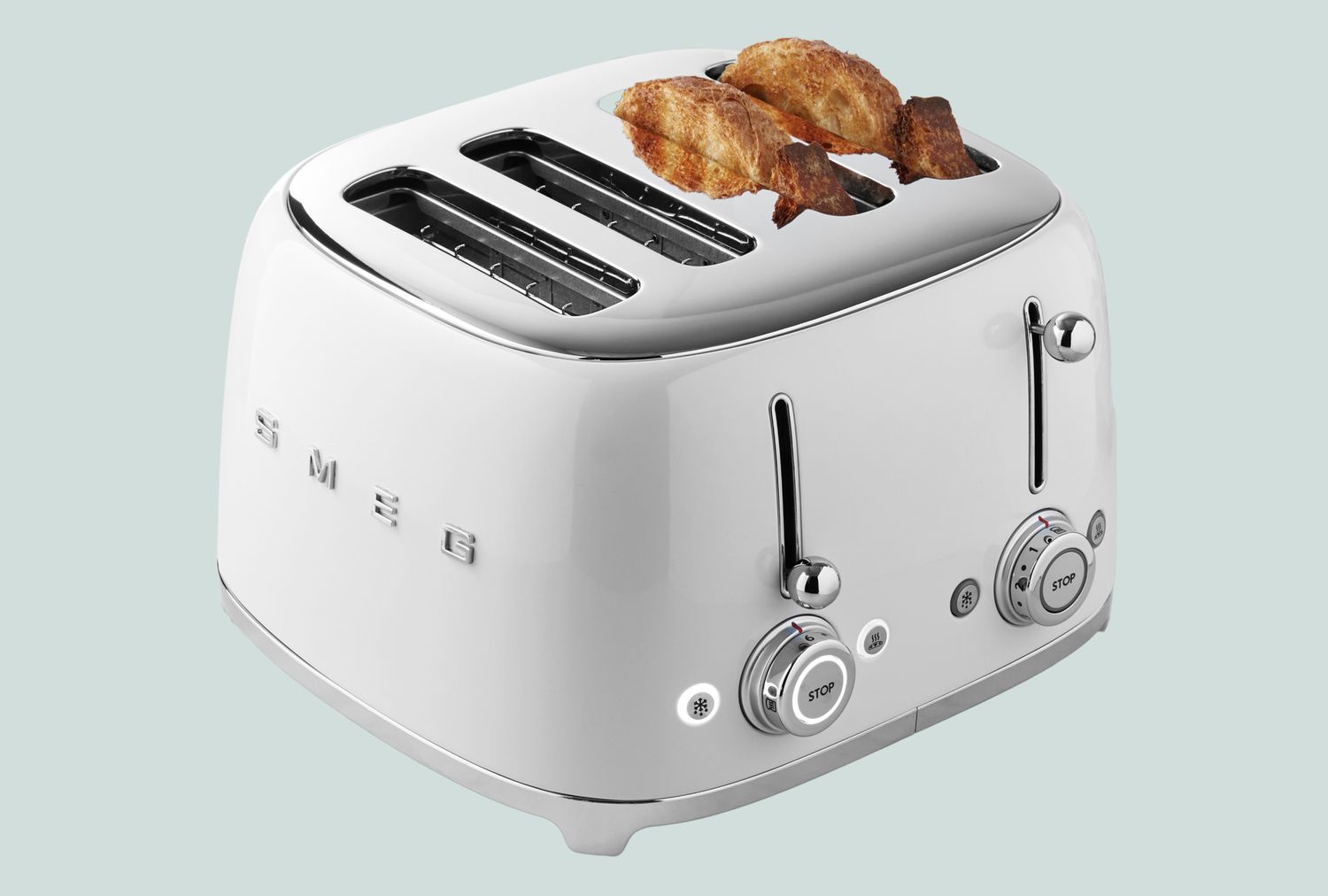 A toaster with two slices of bread inside featuring a sleek modern design