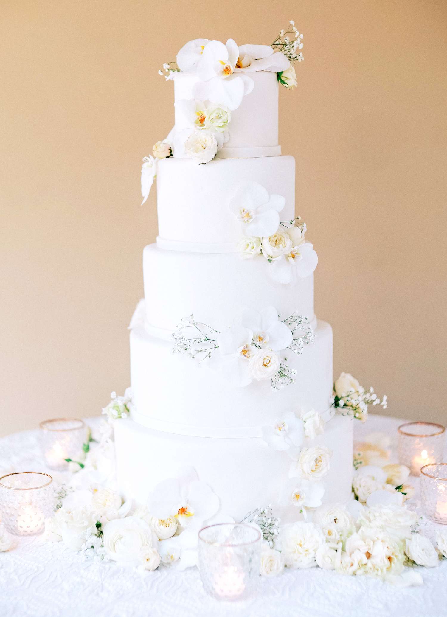 white wedding cake with orchids