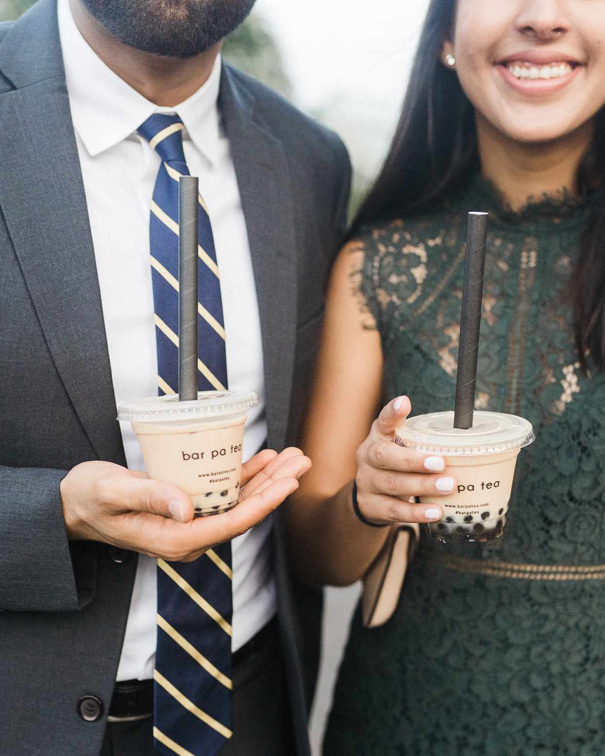 grace john wedding man and woman holding bubble tea