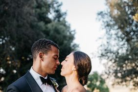 sara sam italy wedding couple holding each other gazing at each other