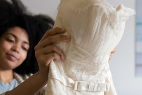 woman holding lacy dress
