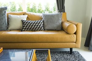 modern leather sofa in minimalist living room