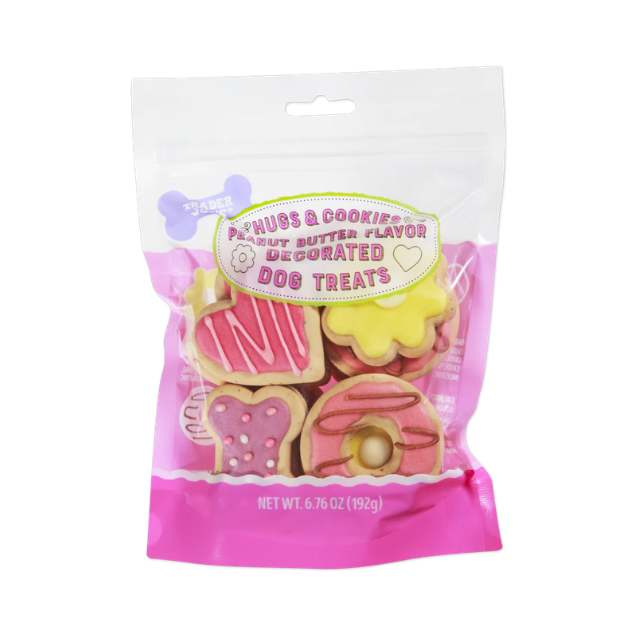 A bag of decorative dog treats shaped like sweets labeled with peanut butter flavor