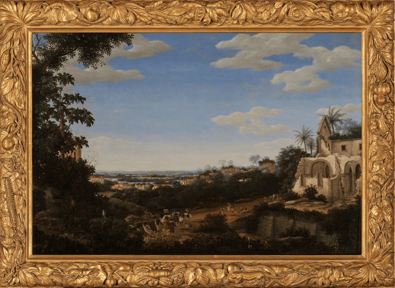 Landscape painting with buildings, trees, and a distant view, framed in ornate gold